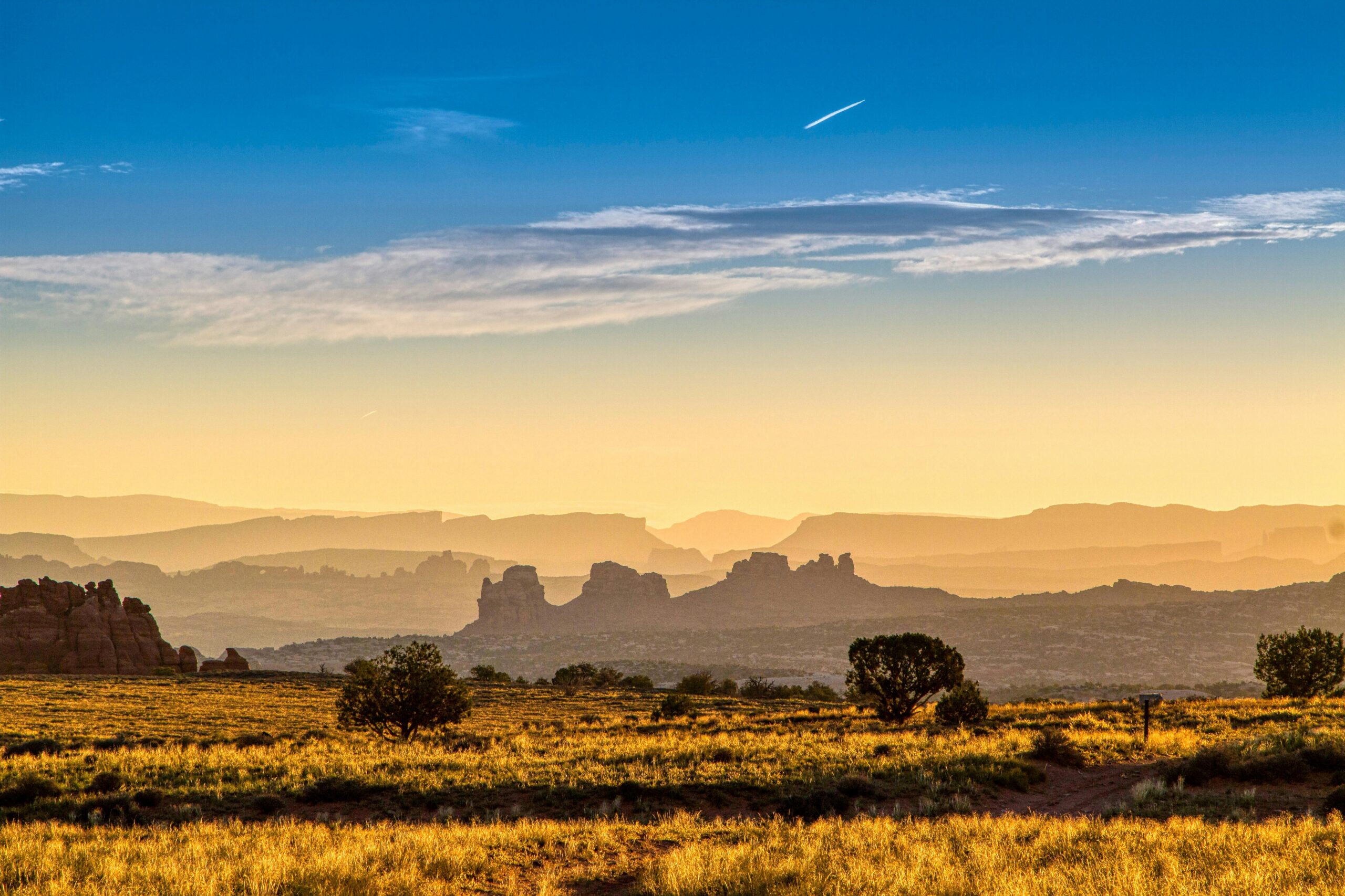 Silhouette of Mountains During Sunrise